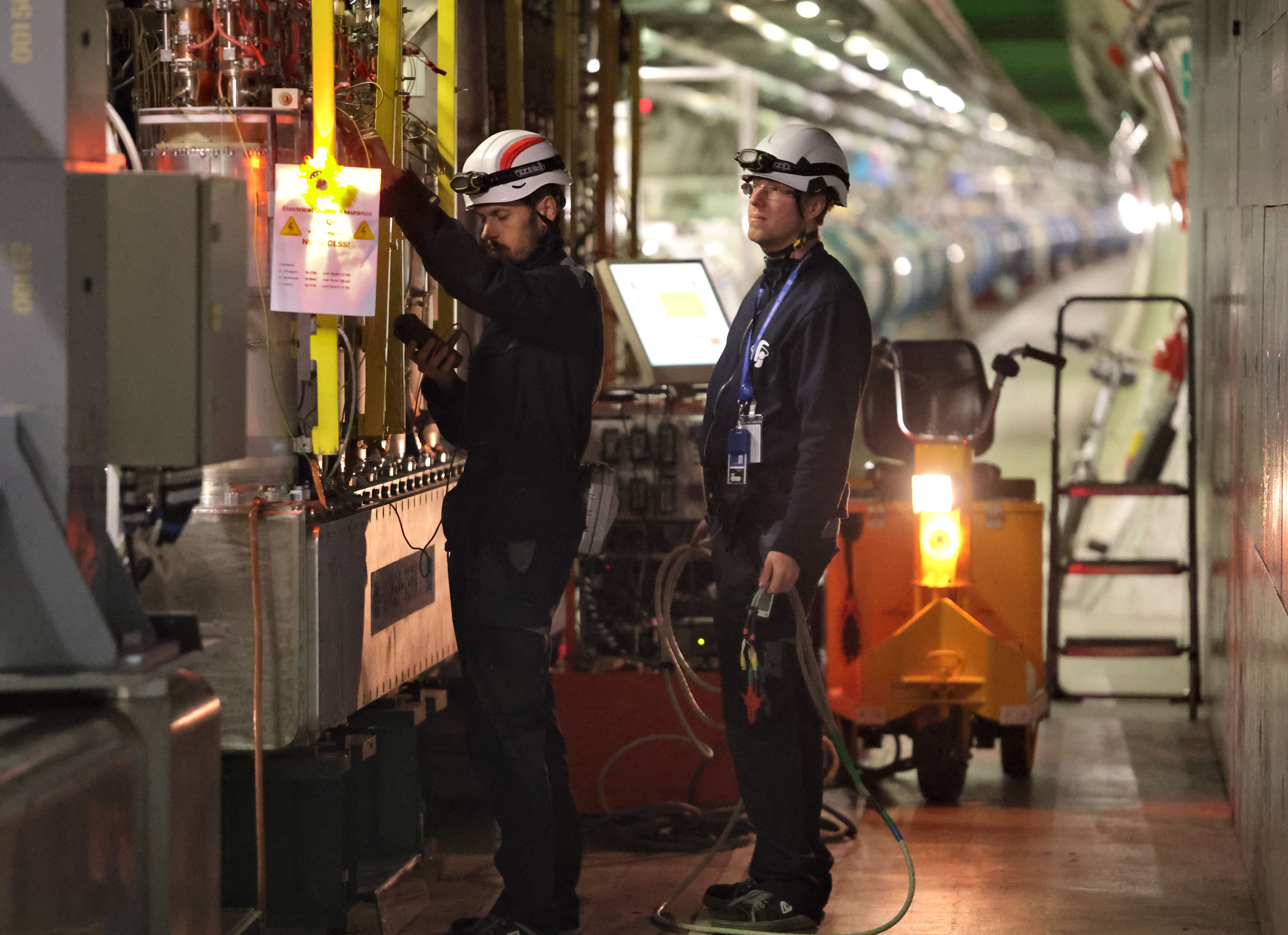 Image 1. ELQA team preparing for the electrical tests of the LHC circuits. Photographer: Jaromir Ludwin. 